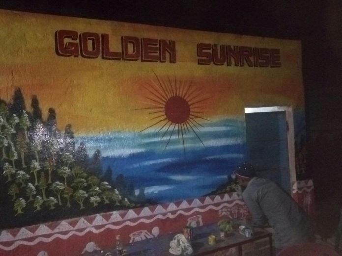 Golden Sunrise Image on PRAYAS Wall Gooden Sunrise Image on PRAYAS Wall
